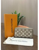 LOUIS VUITTON ZIPPY WALLET IN BICOLOUR MONOGRAM EMPREINTE EMBOSSED LEATHER WITH GOLD HARDWARE 