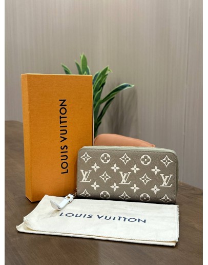 LOUIS VUITTON ZIPPY WALLET IN BICOLOUR MONOGRAM EMPREINTE EMBOSSED LEATHER WITH GOLD HARDWARE 