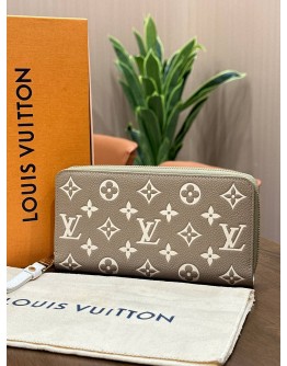 LOUIS VUITTON ZIPPY WALLET IN BICOLOUR MONOGRAM EMPREINTE EMBOSSED LEATHER WITH GOLD HARDWARE 