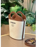 BURBERRY SMALL POCKET BUCKET BAG IN TWO-TONE CANVAS AND LEATHER