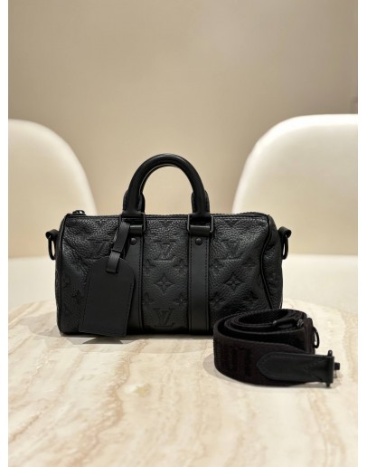 LOUIS VUITTON KEEPALL BANDOULIÈRE 25 IN BLACK MONOGRAM TAURILLON LEATHER