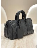 LOUIS VUITTON KEEPALL BANDOULIÈRE 25 IN BLACK MONOGRAM TAURILLON LEATHER