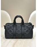 LOUIS VUITTON KEEPALL BANDOULIÈRE 25 IN BLACK MONOGRAM TAURILLON LEATHER