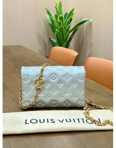 LOUIS VUITTON POCHETTE COUSSIN IN SILVER LAMBSKIN EMBOSSED MONOGRAM LEATHER 