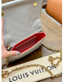 LOUIS VUITTON POCHETTE COUSSIN IN SILVER LAMBSKIN EMBOSSED MONOGRAM LEATHER 