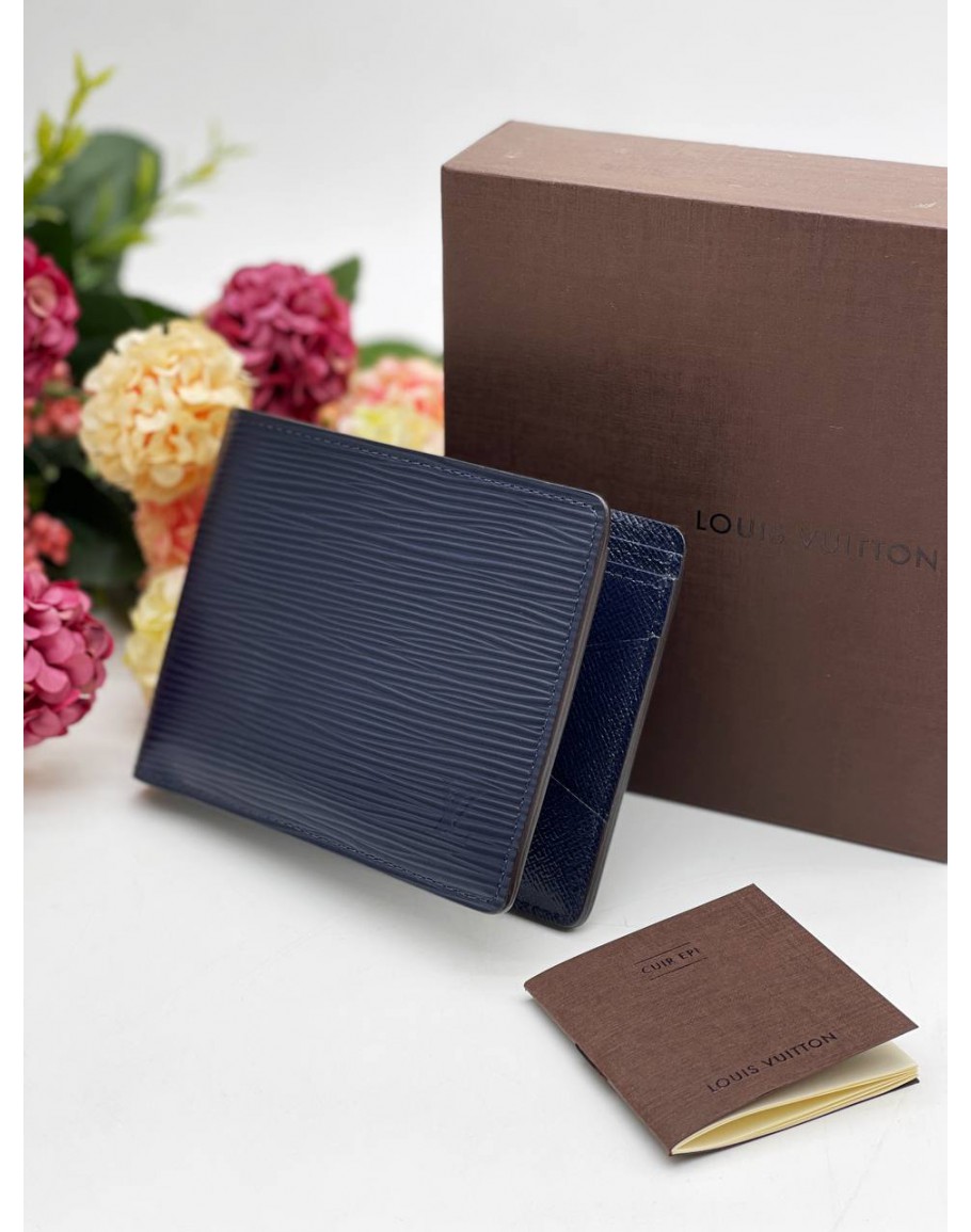 Sold Louis Vuitton Epi Multiple Wallet