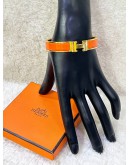 HERMES CLIC CLAC H BANGLE IN CLASSIC ORANGE WITH GOLD PLATED HARDWARE