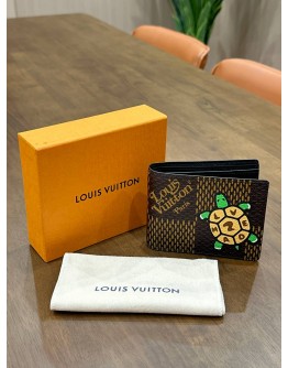 LOUIS VUITTON X NIGO GIANT DAMIER EBENE TORTOISE MULTIPLE WALLET FEATURES WITH PLAYFUL CARTOON TURTLE GRAPHIC " LV MADE " ON SHELL 