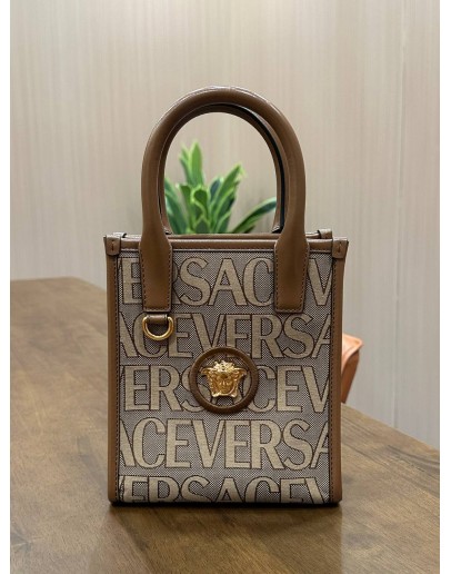 VERSACE LA MEDUSA CANVAS MINI TOTE BAG IN BROWN BEIGE ALLOVER LOGO JACQUARD PATTERN & GOLD TONED HARDWARE OF MEDUSA PLAQUE MIDDLE ON THE FRONT 