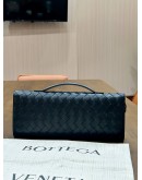 BOTTEGA VENETA ANDIAMO LONG CLUTCH IN BLACK SIGNATURE INTRECCIATO WOVEN LEATHER WITH GOLD HARDWARE 