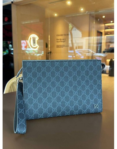 GUCCI GG SUPREME POUCH IN DARK BLUE