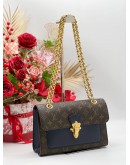 LOUIS VUITTON VICTOIRE IN MONOGRAM LEATHER BAG 