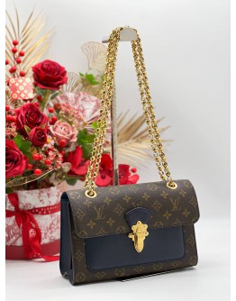 LOUIS VUITTON VICTOIRE IN MONOGRAM LEATHER BAG 