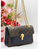 LOUIS VUITTON VICTOIRE IN MONOGRAM LEATHER BAG 