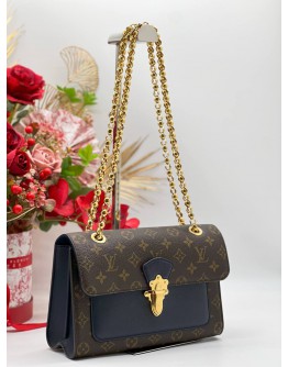 LOUIS VUITTON VICTOIRE IN MONOGRAM LEATHER BAG 