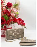 LOUIS VUITTON TOURTERELLE EMPREINTE LEATHER POCHETTE FELICIE IN BEIGE AND WHITE 