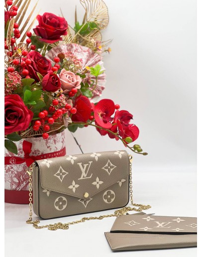 LOUIS VUITTON TOURTERELLE EMPREINTE LEATHER POCHETTE FELICIE IN BEIGE AND WHITE 