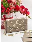 LOUIS VUITTON TOURTERELLE EMPREINTE LEATHER POCHETTE FELICIE IN BEIGE AND WHITE 