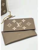 LOUIS VUITTON TOURTERELLE EMPREINTE LEATHER POCHETTE FELICIE IN BEIGE AND WHITE 