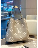 LOUIS VUITTON MM NÉONOÉ IN BICOLOUR TOURTERELLE CRÈME MONOGRAM EMPREINTE LEATHER WITH GOLD HARDWARE