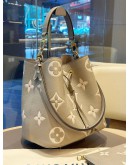 LOUIS VUITTON MM NÉONOÉ IN BICOLOUR TOURTERELLE CRÈME MONOGRAM EMPREINTE LEATHER WITH GOLD HARDWARE