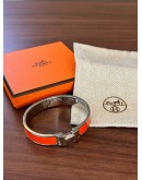 HERMES CLIC CLAC H BRACELET ORANGE ENAMEL WITH STAINLESS STEEL