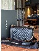 CHANEL MEDIUM CHEVRON BOY IN BLACK CAVIAR LEATHER WITH LIGHT GOLD HARDWARE  