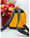 MCM BACKPACK IN YELLOW CANVAS & BLACK CALFSKIN LEATHER