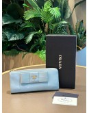 PRADA POWDER BLUE SAFFIANO BOW WALLET  