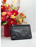 COACH POUCH IN BLACK PEBBLED LEATHER
