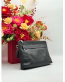COACH POUCH IN BLACK PEBBLED LEATHER