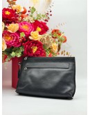 COACH POUCH IN BLACK PEBBLED LEATHER
