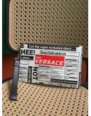 VERSACE NEWSPAPER PRINT CLUTCH WITH WRIST STRAP