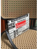 VERSACE NEWSPAPER PRINT CLUTCH WITH WRIST STRAP
