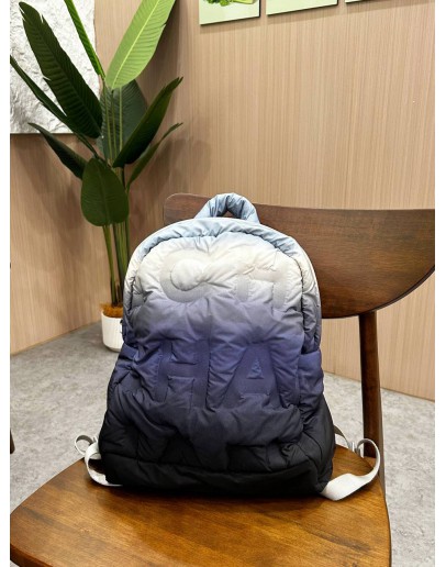CHANEL NYLON EMBOSSED DOUDOUNE BACKPACK IN OMBRE BLUE