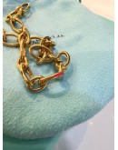 TIFFANY & CO 18K 750 YELLOW GOLD CLASPING OVAL LINK BRACELET