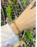 TIFFANY & CO 18K 750 YELLOW GOLD CLASPING OVAL LINK BRACELET