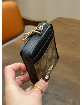 COACH ZIP CARD CASE IN BLOCKED SIGNATURE CANVAS 