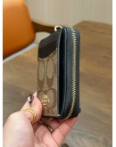 COACH ZIP CARD CASE IN BLOCKED SIGNATURE CANVAS 