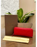 LOUIS VUITTON LONG WALLET IN CHERRY RED EMPREINTE MONOGRAM LEATHER WITH GOLD HARDWARE