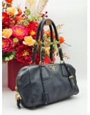 PRADA BAULETTO SHOULDER BAG IN BLACK VITELLO DAINO LEATHER