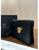 VERSACE LA MEDUSA HEAD IN GOLD AND BLACK CALFSKIN LEATHER CLUTCH