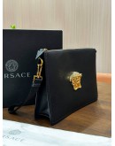 VERSACE LA MEDUSA HEAD IN GOLD AND BLACK CALFSKIN LEATHER CLUTCH