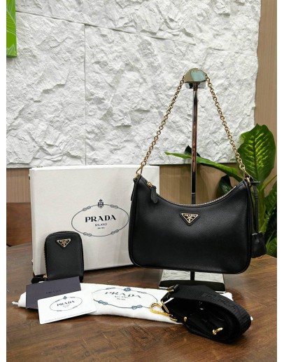 PRADA RE-EDITION 2005 IN BLACK SAFFIANO LUX LEATHER WITH GOLD HARDWARE