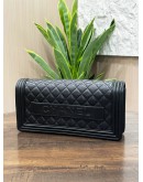 CHANEL BOY EAST WEST CLUTCH IN BLACK LAMBSKIN LEATHER  
