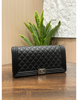 CHANEL BOY EAST WEST CLUTCH IN BLACK LAMBSKIN LEATHER  