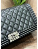 CHANEL BOY EAST WEST CLUTCH IN BLACK LAMBSKIN LEATHER  