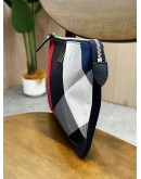 BURBERRY BLACK LABEL CLUTCH IN CHECKED CANVAS