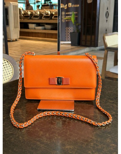 SALVATORE FERRAGAMO VARA BOW CHAIN CROSSBODY BAG IN COWHIDE TANGERINE ORANGE LEATHER