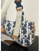 CHRISTIAN DIOR MEN’S SADDLE BAG IN RAFFIA EFFECT DIOR OBLIQUE JACQUARD DENIM CANVAS   